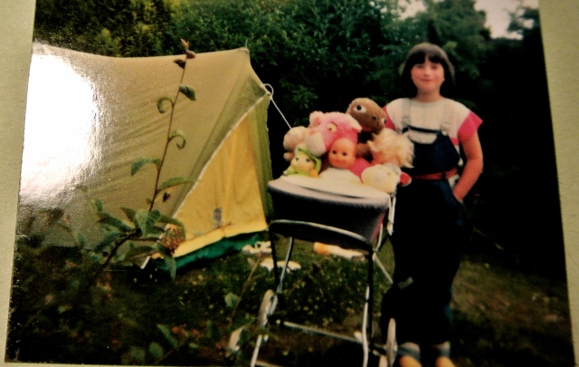 Me, sometime in the late 1980s with my entourage of plush toys - E.T is amongst them, of course!